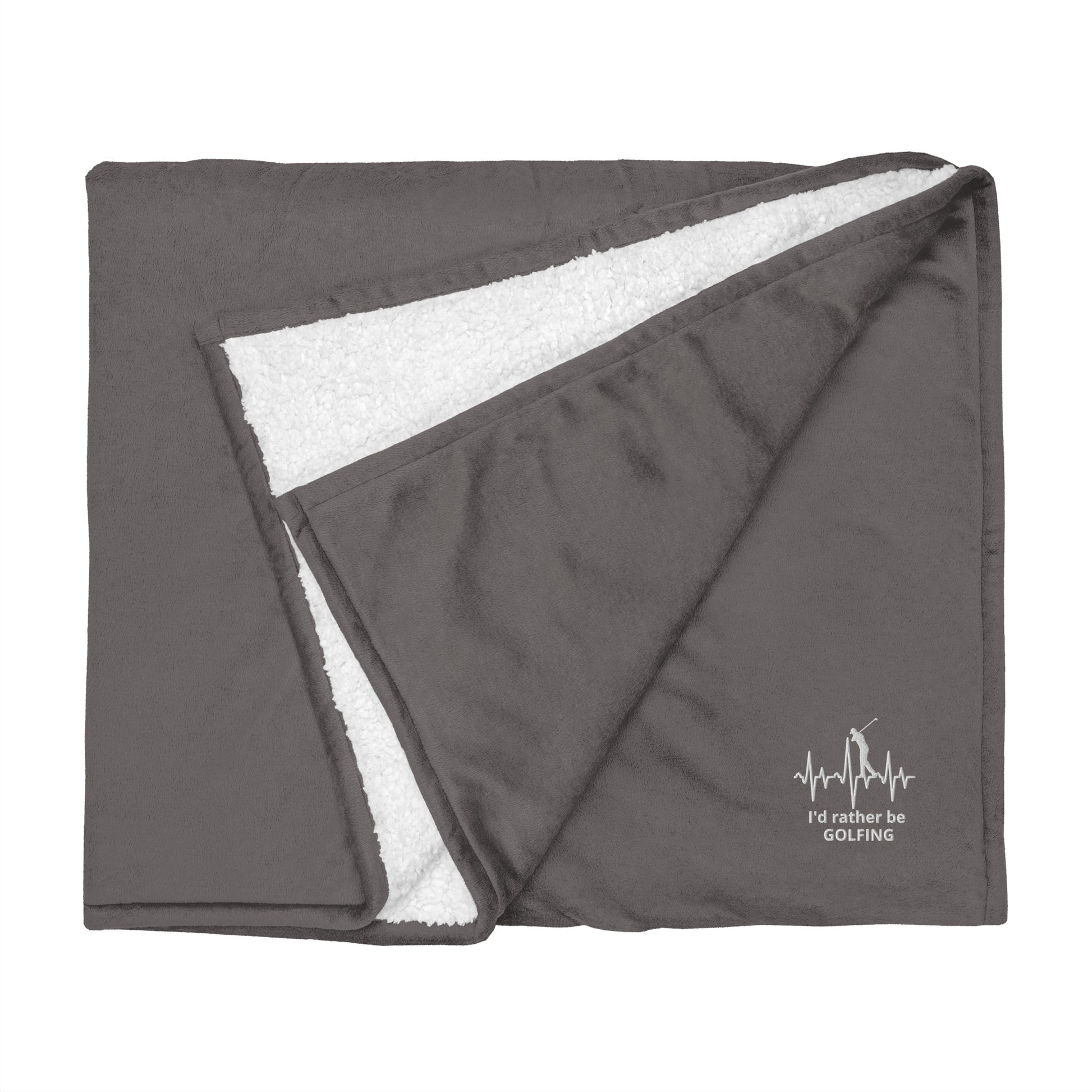 Gray blanket with white fleece lining and 'I'd rather be golfing" branding on a white background
