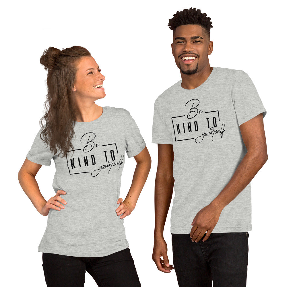 Two people wearing gray t-shirts with text 'be kind to yourself' on a white background