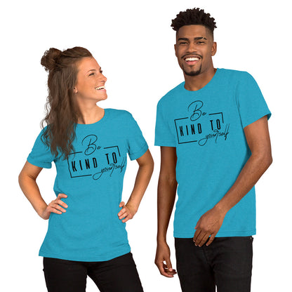 Two people wearing matching blue t-shirts with text 'be kind to yourself' on a white background